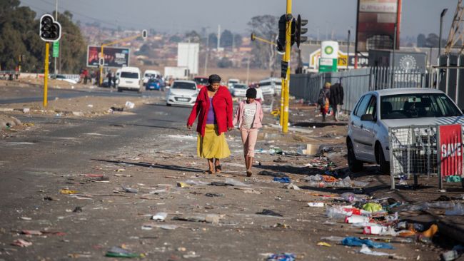 Towns and cities around South Africa are littered with debris as looters go on a rampage. Picture: James Oatway/Getty Images.