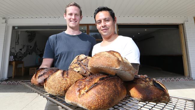 Bread Social owners Thomas Scott and Sam Saulwick at work. Picture Glenn Hampson