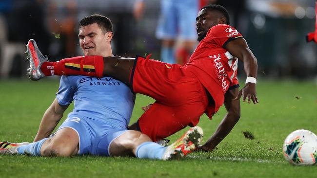 Melbourne City’s Curtis Good and Pacifique Niyongabire got tangled in a battle for the ball at ANZ Stadium. Picture: Getty Images