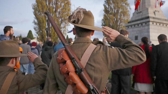 Members of C squadron, 3rd Lighthorse Regiment, Historic Troop salute. Picture: Patrick Gee