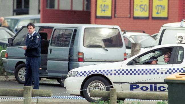 Police at the scene of the 2003 shootings.