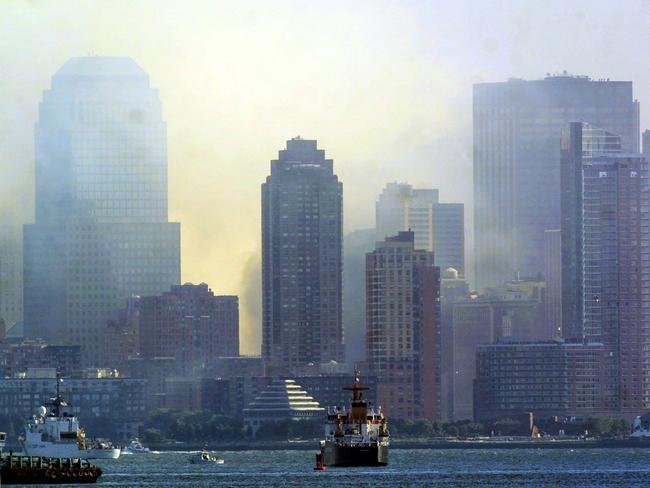 Smoke rises from the rubble of the World Trade Centre in an image taken from Staten Island. Picture: AFP