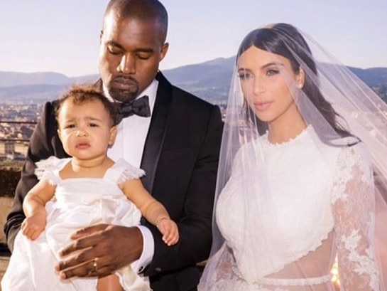 Kanye with Kim Kardashian and daughter North.