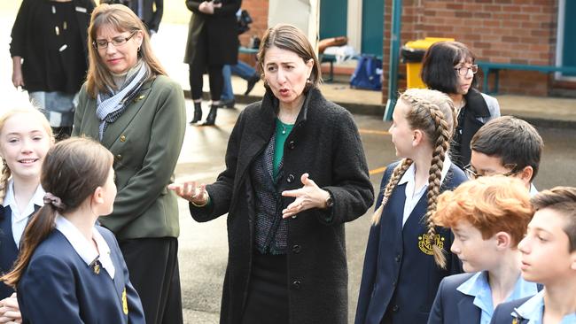 Premier Gladys Berejiklian speaks with students at Panania Public School. Picture: Peter Rae