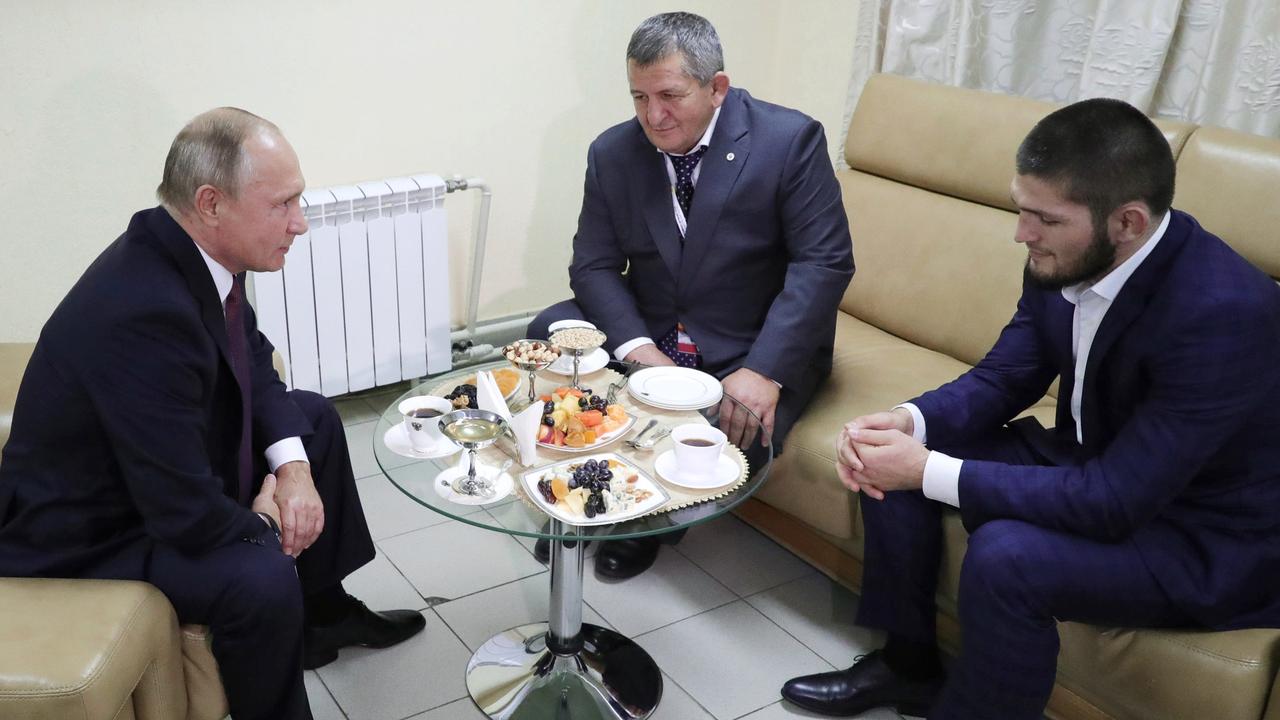 Russian President Vladimir Putin hosts Khabib Nurmagomedov. Picture: AP.