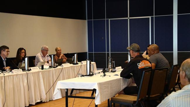 Wildlife guide David White and North Queensland Land Council director Warren Martens present to the committee at Cairns Surf Life Saving Club in Palm Cove on Thursday. Picture: Elodie Jakes