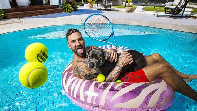 Jackson O'Doherty in his pool at his luxury Gold Coast home. Picture: Nigel Hallett