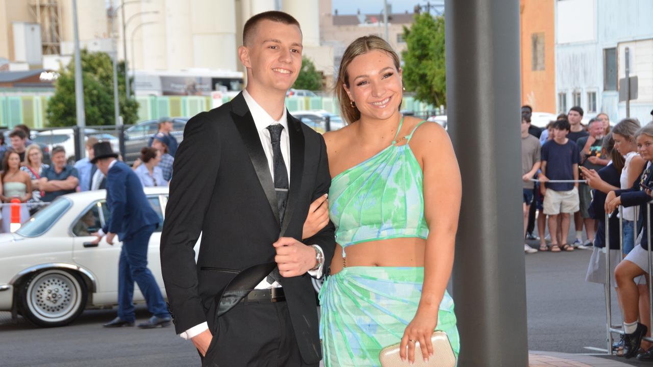 Toowoomba school formals. At the 2023 St Ursula's College formal is graduate Emily Dolley with her partner. Picture: Rhylea Millar