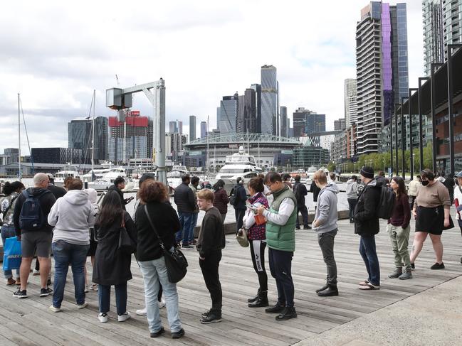 A large queue at a Docklands polling booth. Picture: David Crosling