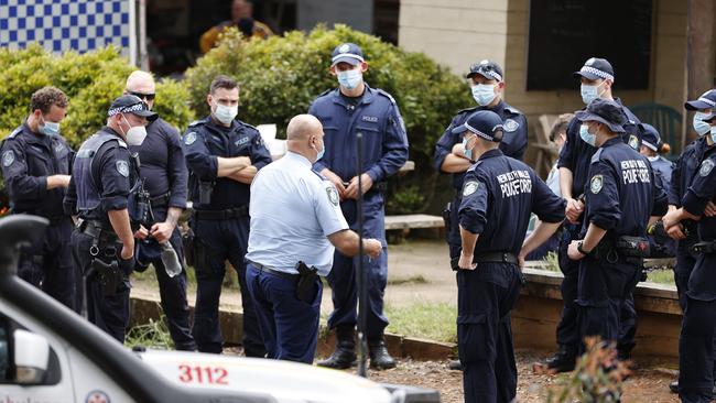 Police gather before heading out to search for Charlise. Picture: Tim Hunter