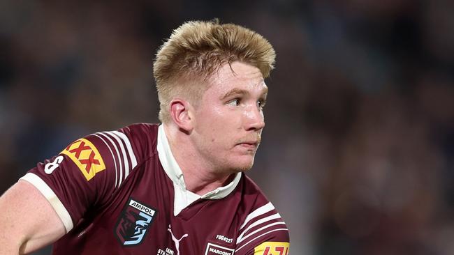 SYDNEY, AUSTRALIA - JUNE 05: Tom Dearden of the Maroons runs the ball during game one of the 2024 Men's State of Origin Series between New South Wales Blues and Queensland Maroons at Accor Stadium on June 05, 2024 in Sydney, Australia. (Photo by Matt King/Getty Images)