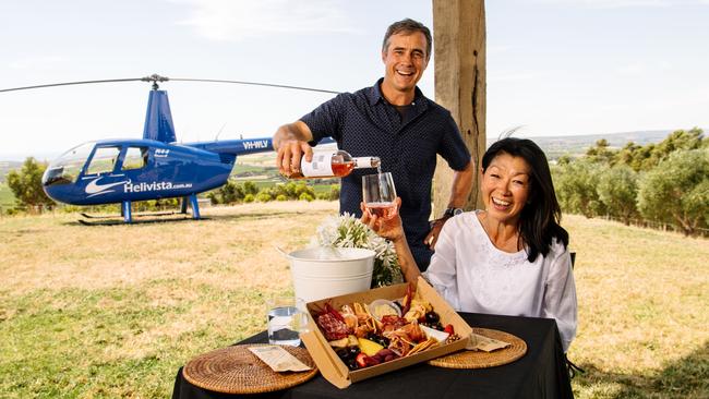 Paul and Mei Ling Beck of Helivista, who have launched their Heli Fly-Through lunch experiences in McLaren Vale. Picture: Morgan Sette.