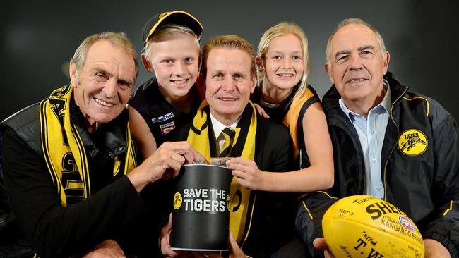 Glenelg Football Club legend Graham Cornes, fan Joe Chigwidden, president Nick Chigwidden, fan Summer Ryan and club legend Peter Carey at the launch of the club's 'Save the Tigers' fund in 2016. Picture: Bianca De Marchi