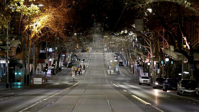 Melbourne’s streets were quiet after curfew was enforced on Sunday night. Picture: Darrian Traynor/Getty Images.