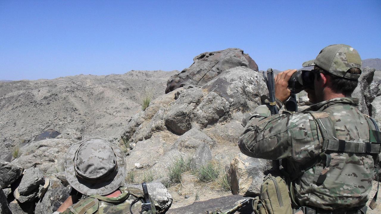 Australian Special Operations Task Group soldiers watch the valley during the Shah Wali Kot Offensive in Afghanistan, June 2010. Picture: Defence Department