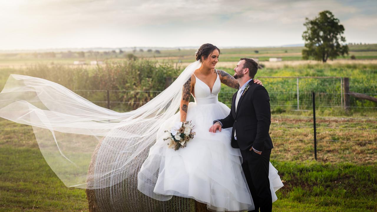 Queensland couple had their dogs as their best man and maid of