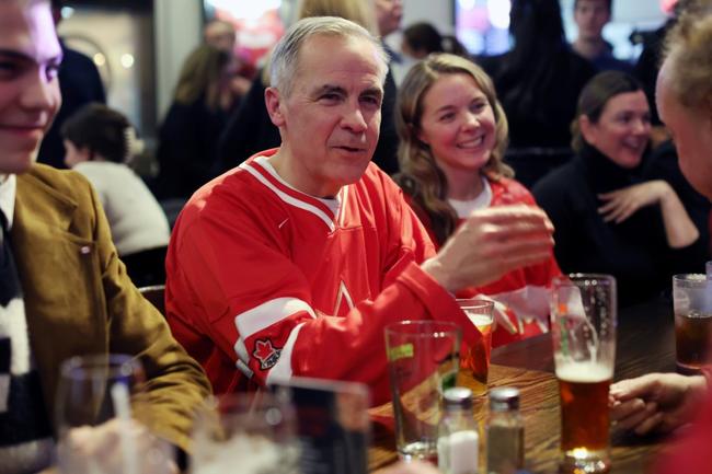 Canada's Liberal Party candidate Mark Carney attends a hockey watch party in Ottawa in February 2025