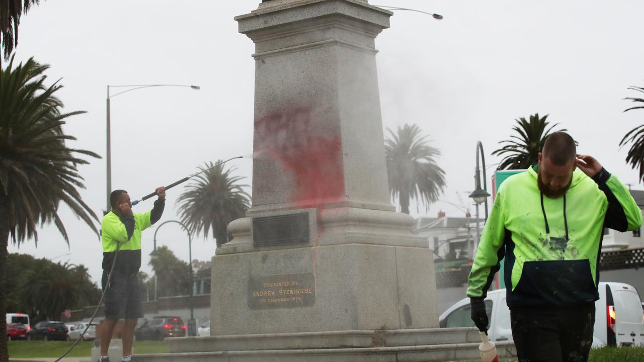 Cleaners spraying clean the memorial. Picture: NCA NewsWire / David Crosling