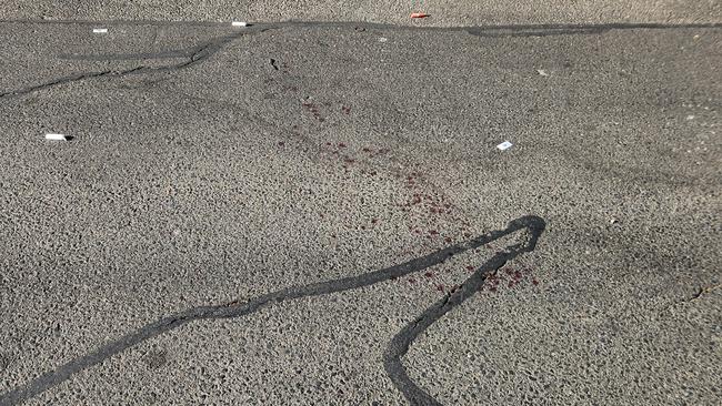 Blood on the street outside of a Parkside unit block. Photo: Darcy Fitzgerald