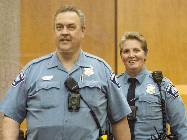 Minneapolis Police Officers Philip Hodapp and Hilary Glasrud arrive at the Hennepin County Government Center. Picture: Angus Mordant for Newscorp Australia