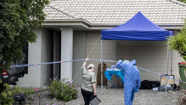 Police at a home at Bundamba investigating the circumstances surrounding the death of Krystle Monks.