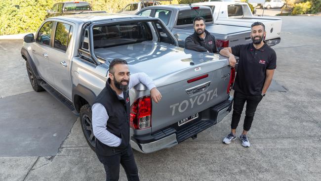 Massih Aimaq (centre), along with his brother Masood Aimaq (right) and life-long friend Omer Dost (left), are the founders and directors of ute 'bling' makers HSP 4x4 Accessories.  Supplied image