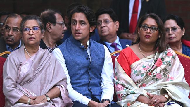 Family members of Bangladesh's Prime Minister Sheikh Hasina: sister Sheikh Rehana, nephew and Rehana's son Radwan Mujib and daughter Saima Wazed look on as she addresses a press conference on Sunday. Picture: AFP