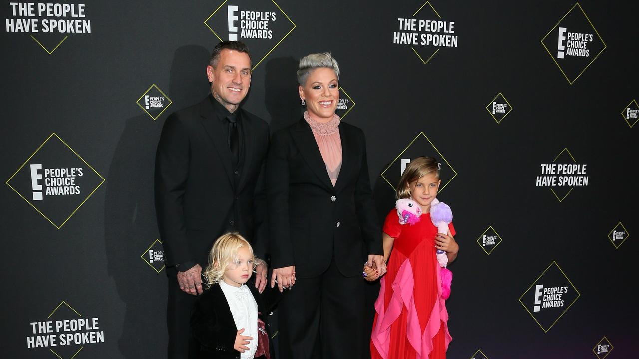 US Singer/songwriter Pink with her husband pro-motorcycle racer Carey Hart and their children Willow Sage Hart (R) and Jameson Moon Hart. Picture: Jean-Baptiste Lacroix/AFP