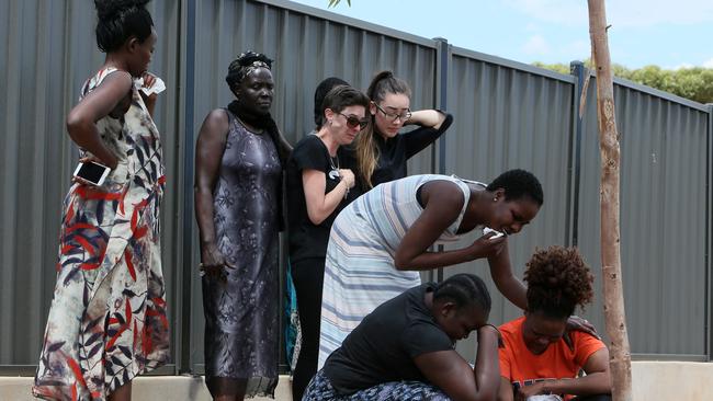 Friends and family mourn Bor’s death at the site of the crash. Photo: Emma Brasier