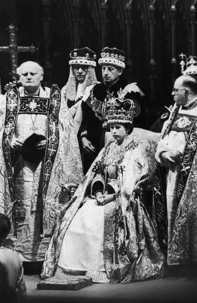 Queen Elizabeth II, Archbishop of Canterbury Dr Geoffrey Fisher and dignitaries at the Coronation, Westminster Abbey, in 1953. Picture: Getty