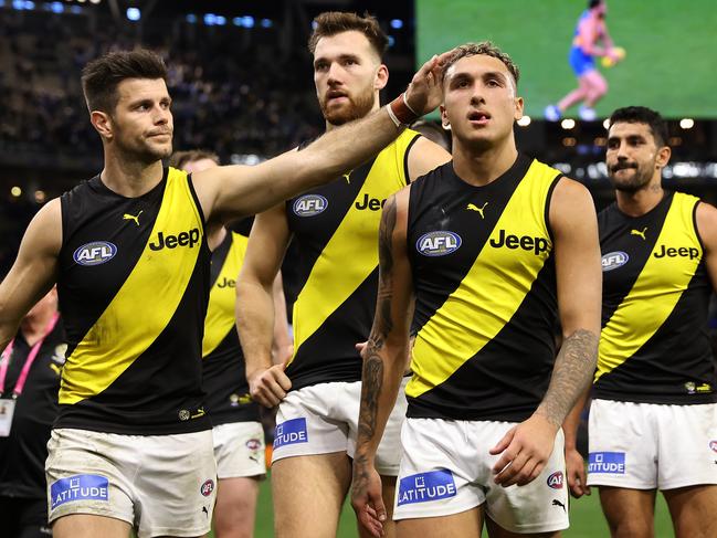 PERTH, AUSTRALIA - JUNE 13: Trent Cotchin of the Tigers consoles Shai Bolton while walking from the field after being defeated during the round 14 AFL match between the West Coast Eagles and the Richmond Tigers at Optus Stadium on June 13, 2021 in Perth, Australia. (Photo by Paul Kane/Getty Images)