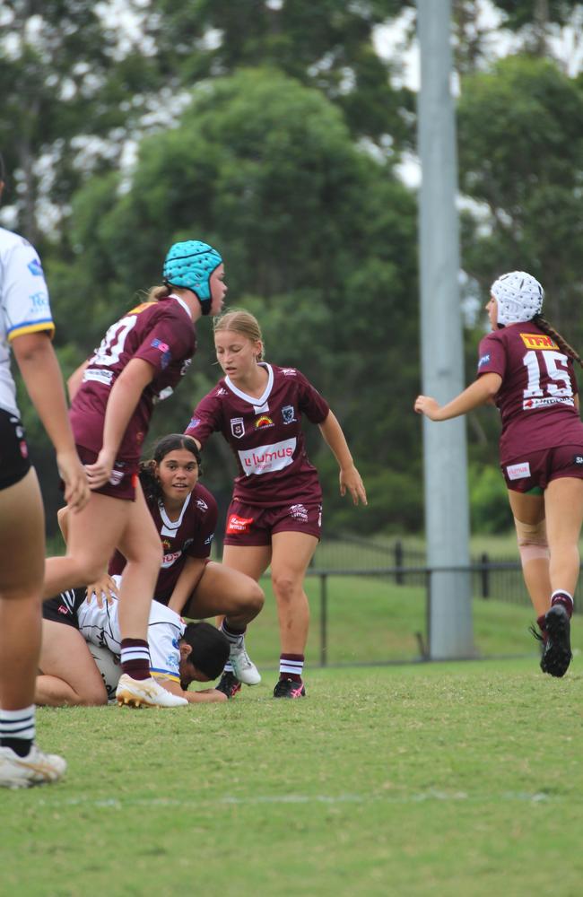 Yamun-Gunda Kelly (looking up) makes a tackle during the 2024 club season.