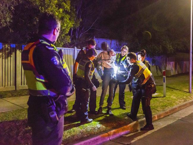 Police had their hands full with wayward teens the night the Herald Sun rode with them. Picture: Valeriu Campan. Picture: Valeriu Campan