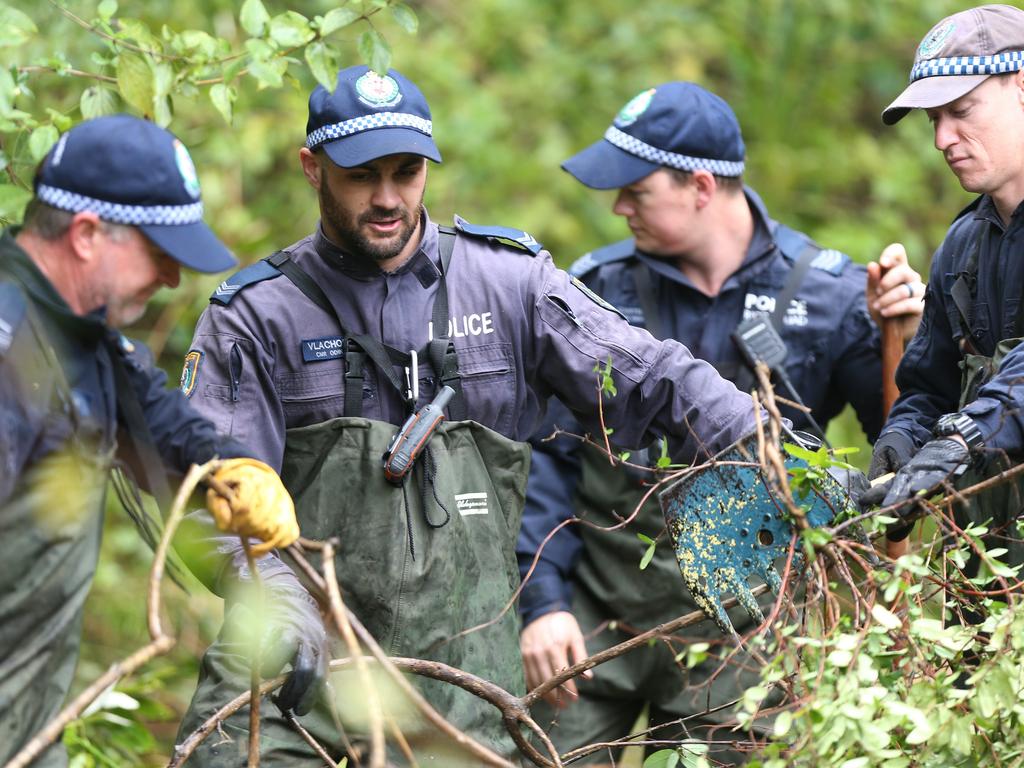 A woman said she had seen a man observing the ‘blood find’ from a ute parked off the side of the road. Picture: Peter Lorimer.