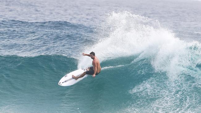 Surfers at Snapper Rocks and Kirra riding the Large swell produced by Cyclone OMA. Photograph : Jason O'Brien