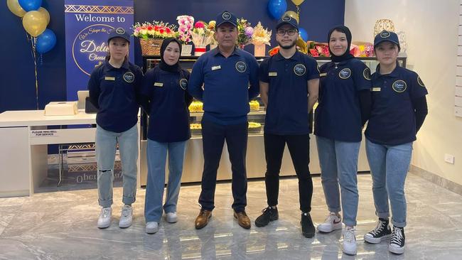 Sania, Somaya, Mohammad, Khudadad, Suraya and Sokaina Haidari at the family store. Picture: Supplied