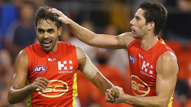 GOLD COAST, AUSTRALIA - APRIL 09: Jack Martin of the Suns celebrates a goal during the round three AFL match between the Gold Coast Suns and the Carlton Blues at Metricon Stadium on April 9, 2016 in Gold Coast, Australia. (Photo by Chris Hyde/Getty Images)