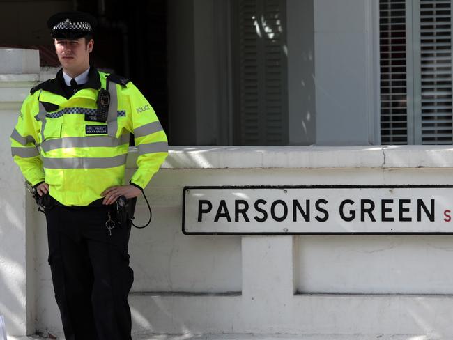 A police officer stands next to a street sign near Parsons Green Underground Station. Picture: Getty Images