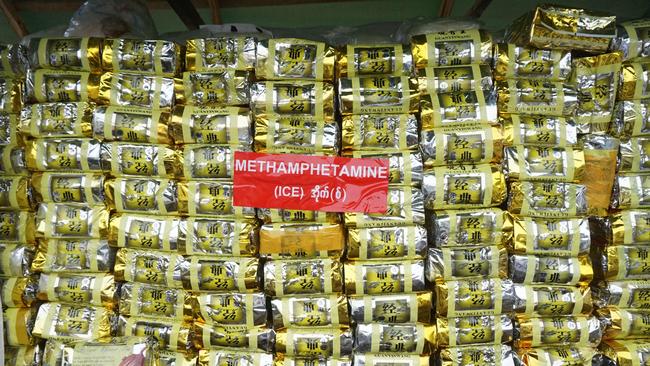 A stack of illegal methamphetamine before being set on fire and destroyed. Asian drug trafficking networks are increasingly using sea routes to smuggle meth out of Myanmar and ramping up ketamine production as they seek to expand their business, the UN warned on June 2. Picture: AFP