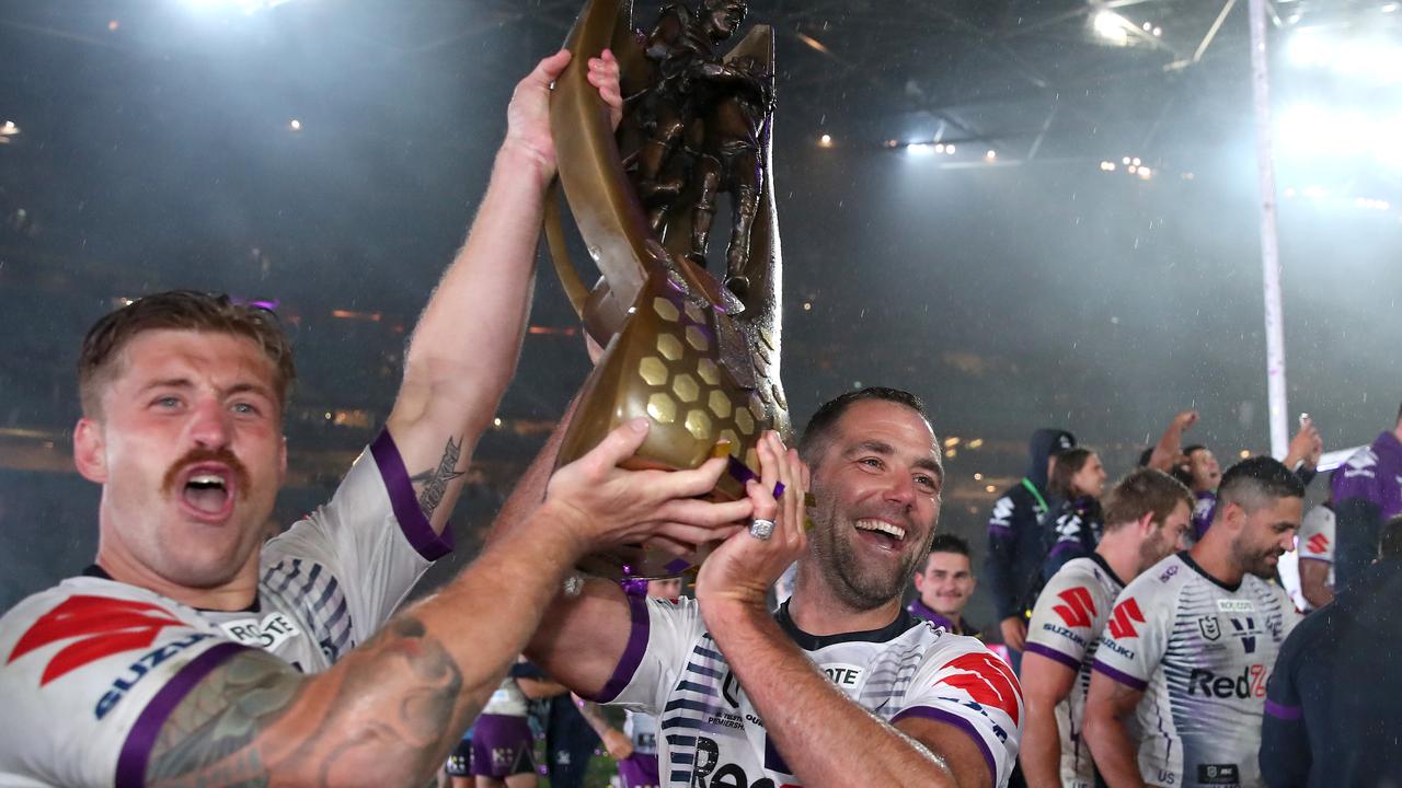 Cameron Munster and Cameron Smith wiht the 2020 premiership trophy. Smith has lashed his former teammates. Picture: Spencer/Getty Images