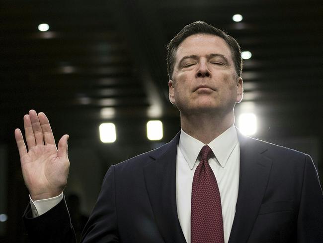 Former FBI director James Comey is sworn in during a hearing before the Senate Select Committee on Intelligence on Capitol Hill where he repeated allegations that President Donald Trump badgered him over an investigation into Russia's meddling in the 2016 election. Picture: AFP