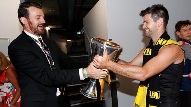 Brendon Gale and Tigers skipper Trent Cotchin celebrate winning the 2020 AFL Grand Final against Geelong at The Gabba in 2020. Picture: Michael Willson/Getty Images