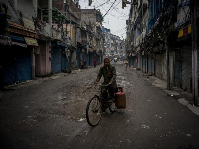 New Delhi imposed a weekend curfew to curb the spread of Covid-19 infections driven by the Omicron variant. Coronavirus infections hit an eight-month high in India. Picture: Getty Images