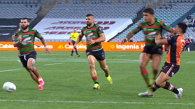 Latrell Mitchell's shot on David Nofoaluma.