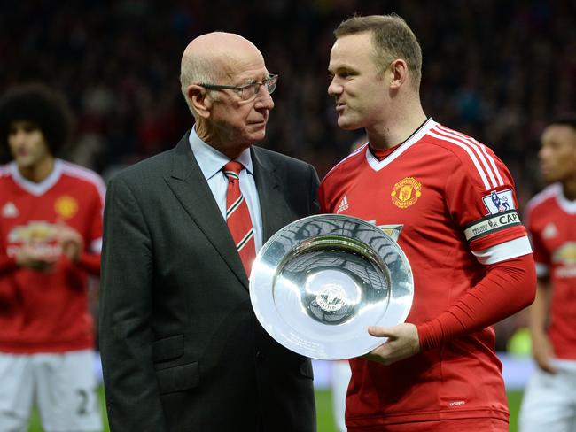 Bobby Charlton with Wayne Rooney who overtook his games and goals record in 2017. Picture: AFP