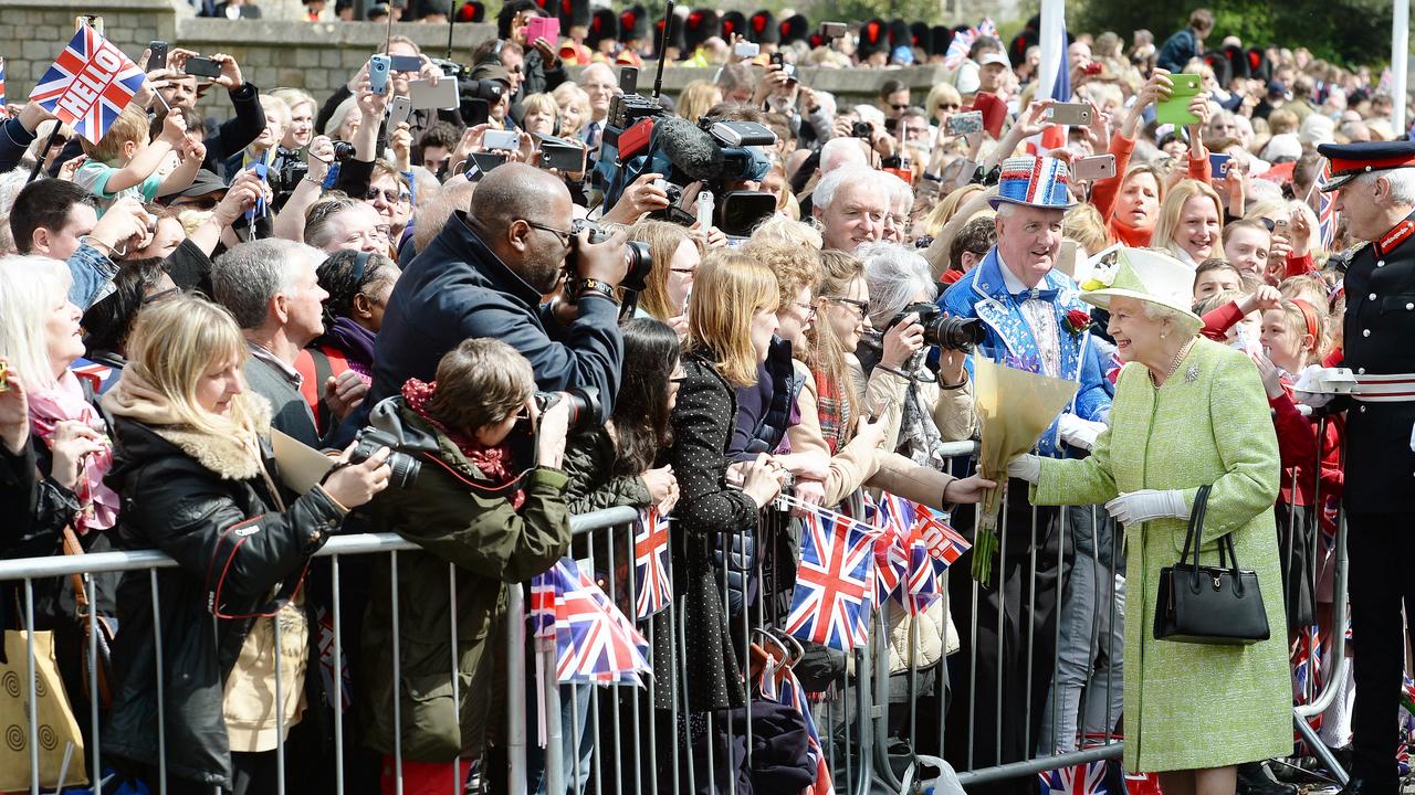 The Queen greets wellwishers during a 'walkabout' on her 90th birthday in Windsor. Picture: AFP