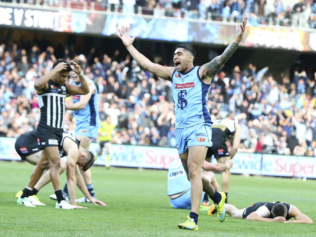 It’s all over - Byron Sumner celebrates on the siren. Picture Sarah Reed