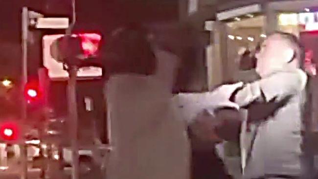 John Barilaro in a tussle with a videographer.