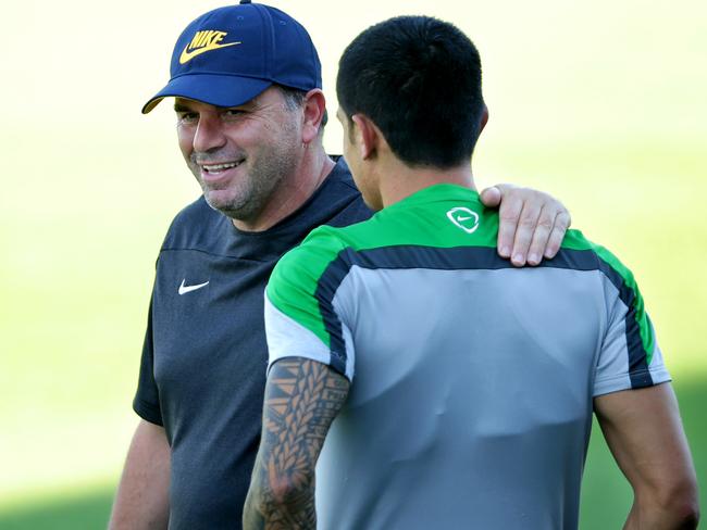 Socceroos coach Ange Postecoglou shares a laugh with Tim Cahill.