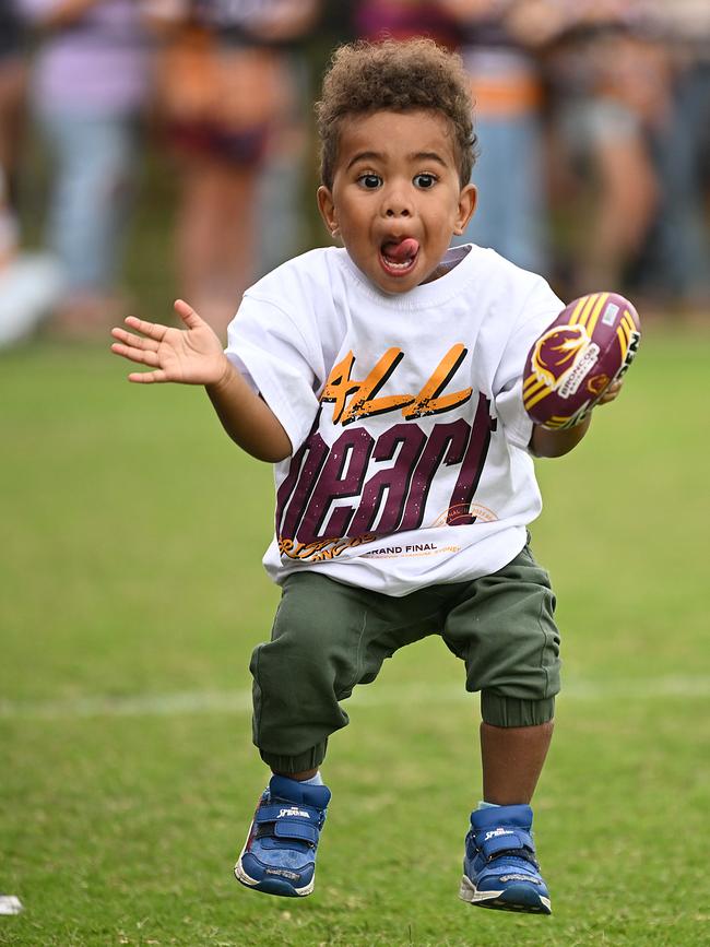 25/9/2023: Ethan Tapo 2 , gets very excited during a Broncos fan training session at the Red Hill, Brisbane. pic: Lyndon Mechielsen/Courier Mail